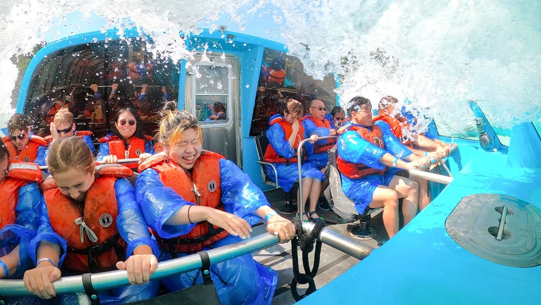 Guests enjoying the Freedom jet boat tour in Niagara River Gorge, Canada.