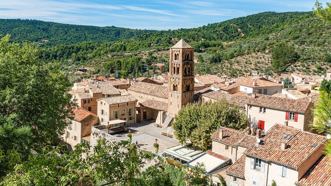 Gorges du Verdon village view with historic church tower and surrounding landscape.