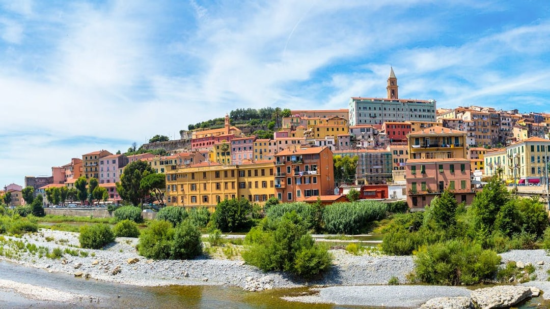 Colorful hillside buildings in the Italian Riviera, part of the Monte Carlo full-day tour.