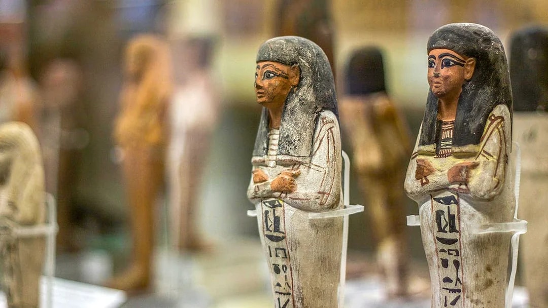 Ancient Egyptian figurines displayed at the National Museum of Egyptian Civilization in Cairo.