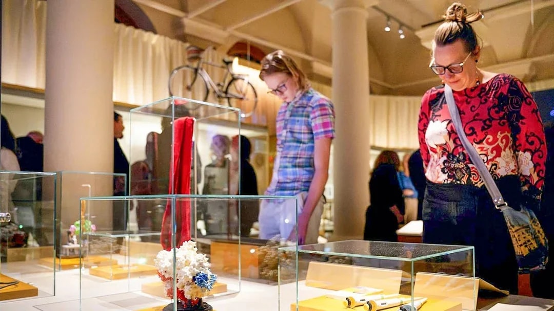Visitors observing exhibits at the Nobel Prize Museum in Stockholm.