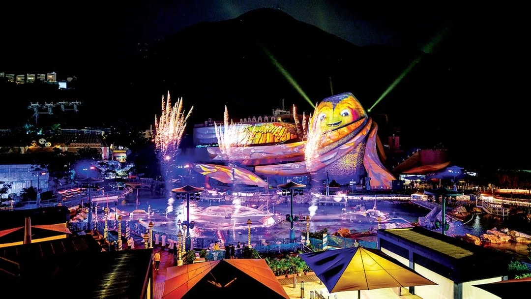 Lights show with fireworks at Ocean Park Hong Kong, featuring colorful sea creature display.