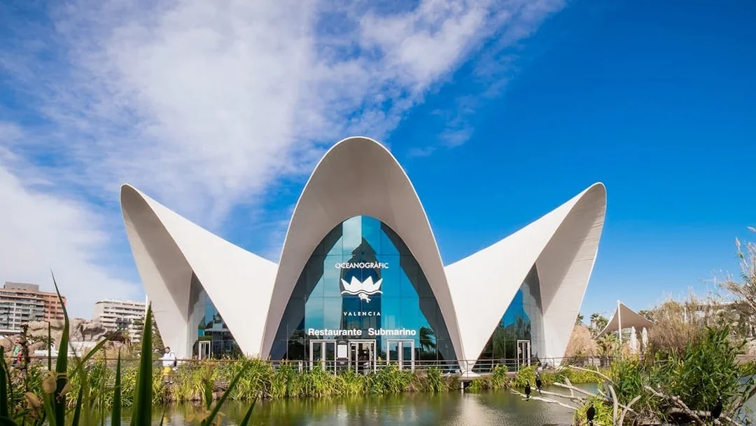 Oceanogràfic Valencia entrance with unique architecture and surrounding pond.