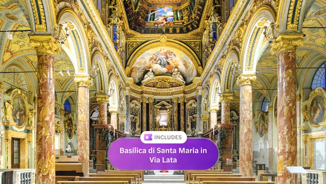 Interior of Santa Maria in Via Lata with ornate frescoes and marble columns, Rome.