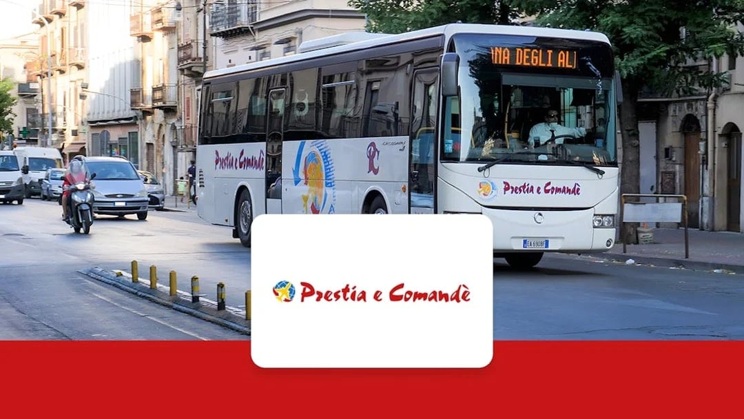 Prestia e Comandè bus on a street in Palermo, offering airport-city center transfers.
