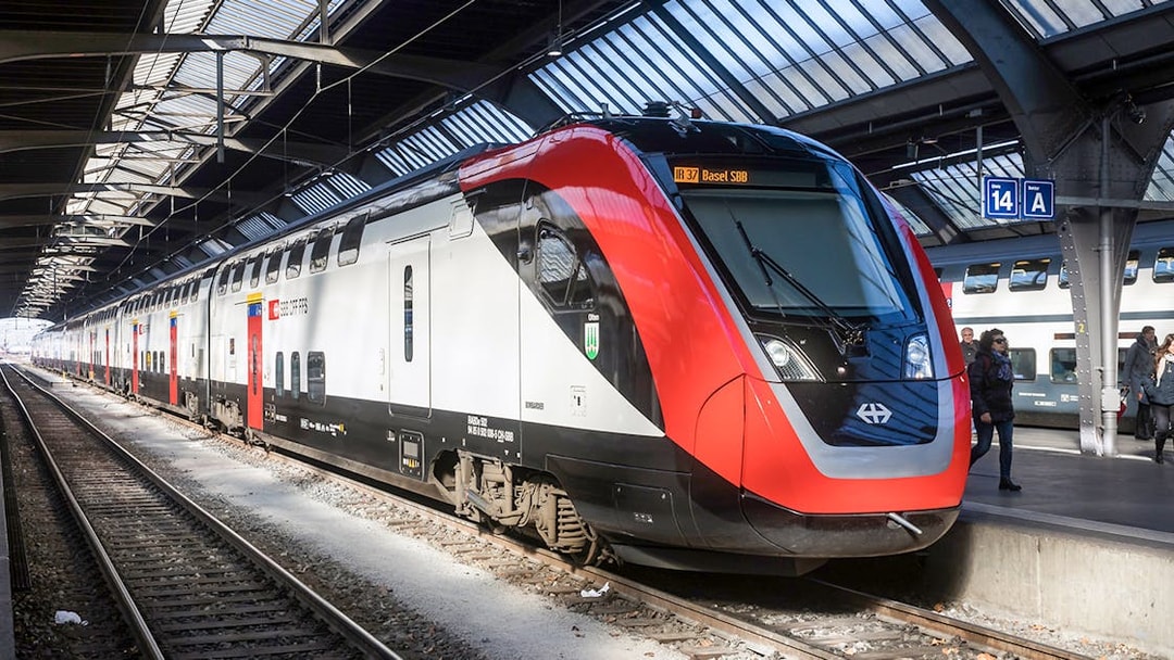 Train at Zurich station platform for one-way trip to Zurich Central.