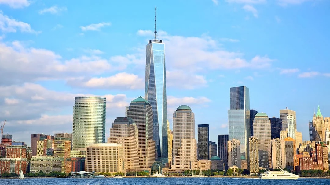 One World Observatory with New York City skyline in the background.
