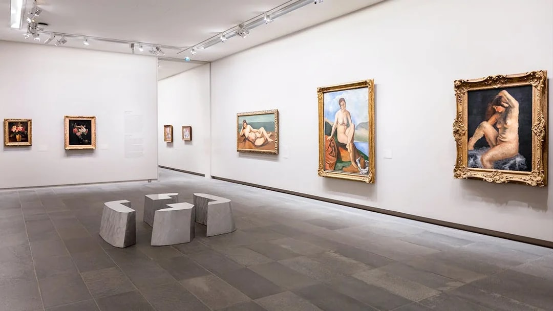 Artworks displayed inside Orangerie Museum, Paris, featuring classic paintings.