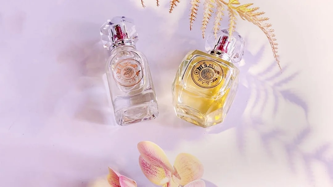 Perfume bottles with floral decor at Scentopia Sentosa Singapore.