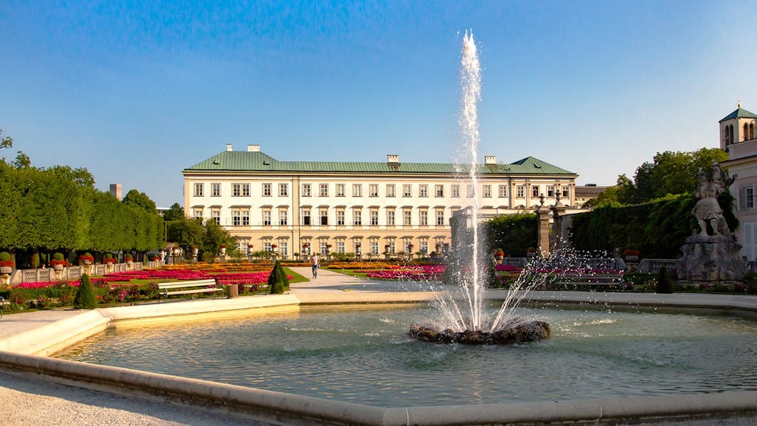 Mirabell Palace gardens with fountain in Salzburg, featured in the Original Sound of Music Tour.