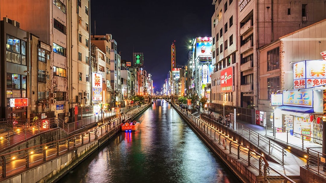 Tombori River Cruise at night, view of illuminated Dotonbori, Osaka.