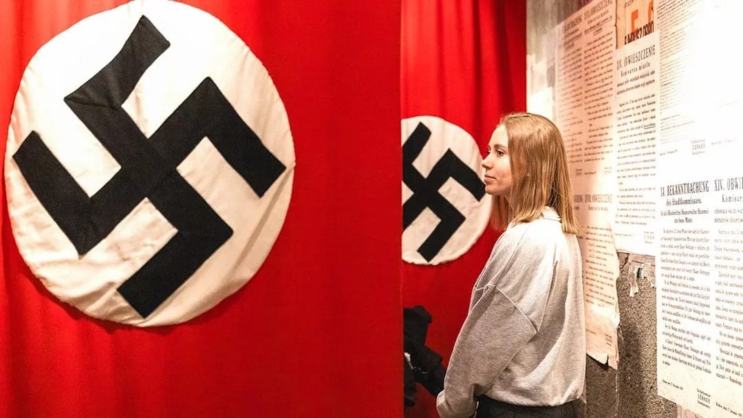 Nazi flag display inside Oskar Schindler's Factory museum exhibit.