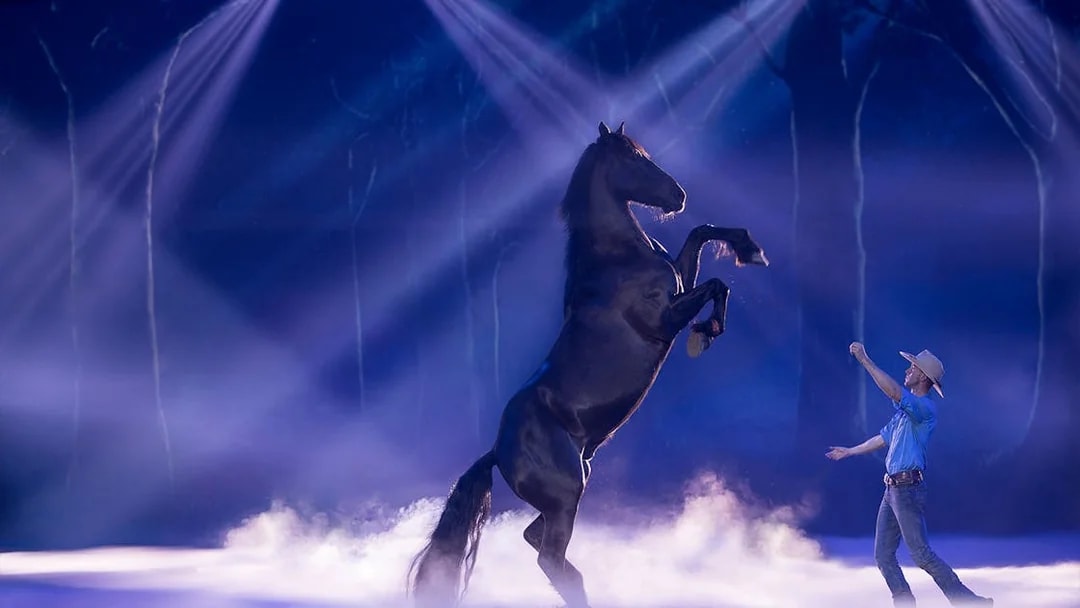 Horse rearing during Australian Outback Spectacular Heartland Dinner & Show performance.