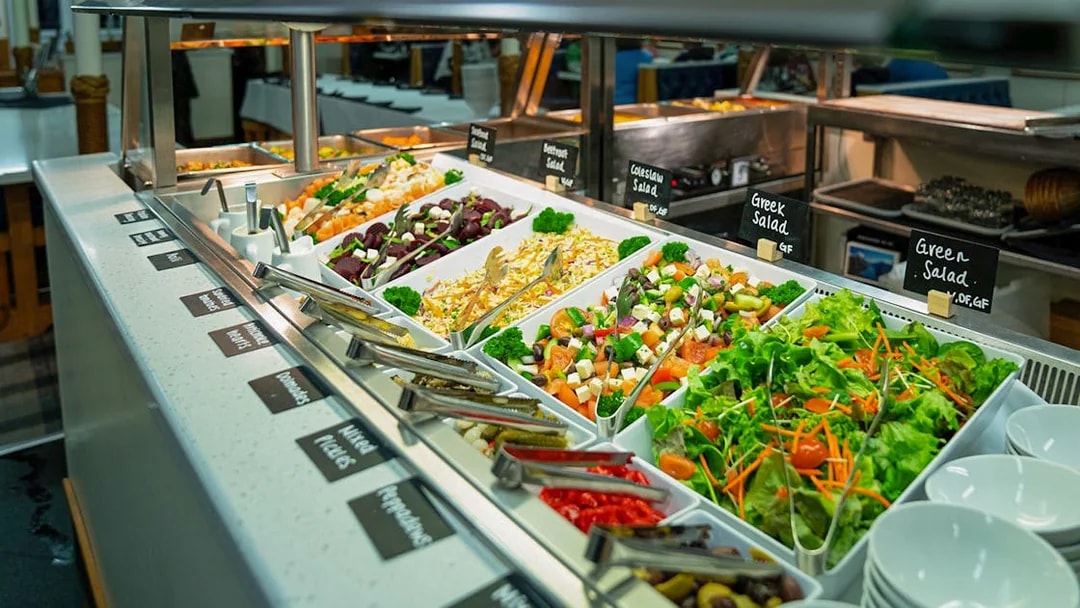 Buffet with assorted salads on Overnight Milford Sound Cruise.