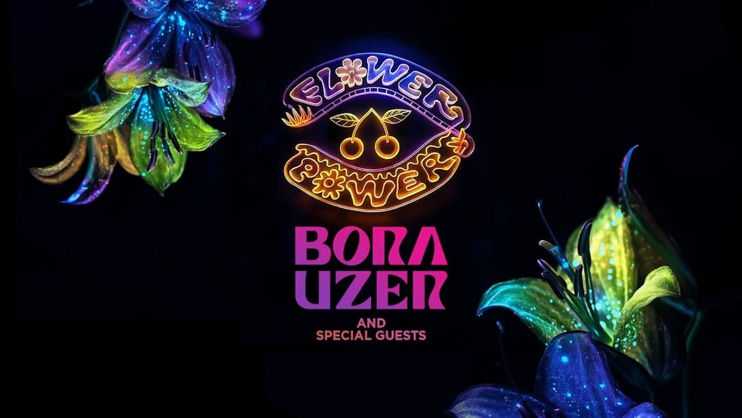 Neon sign with "Flower Power" and colorful flowers for Pacha's Saturday event featuring Bora Uzer.