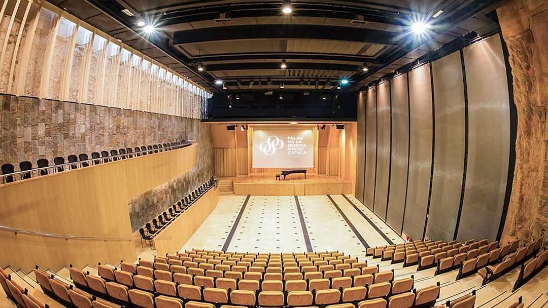 Petit Palau auditorium at Palau de la Música Catalana, Barcelona, featuring seating and stage.