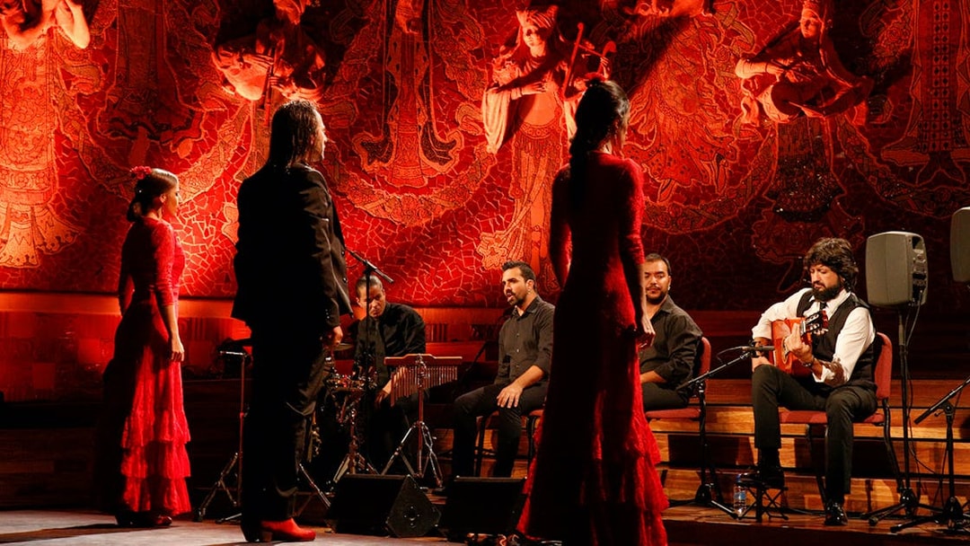 Flamenco performers on stage at Poliorama Theater, Barcelona.