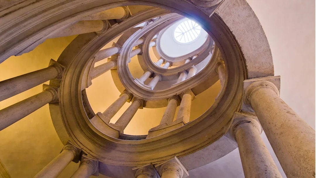Barberini Palace spiral staircase in Rome, view from below, featured in skip-the-line tour tickets.
