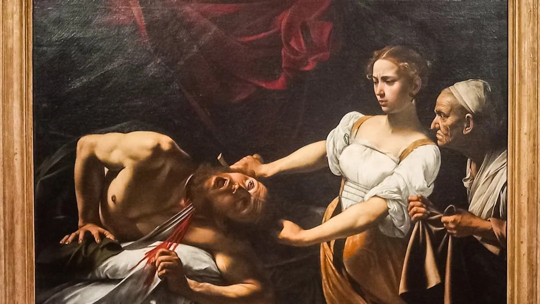 Judith Beheading Holofernes painting by Caravaggio, depicting dramatic biblical scene.