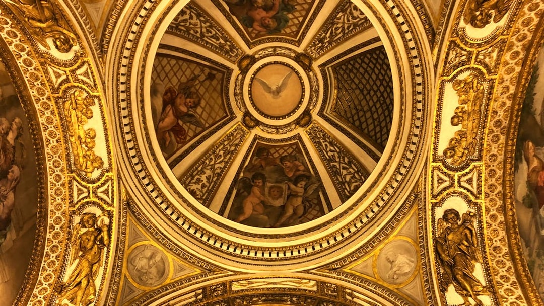 Ceiling artwork with cherubs and gold details at Palazzo Barberini, Rome.