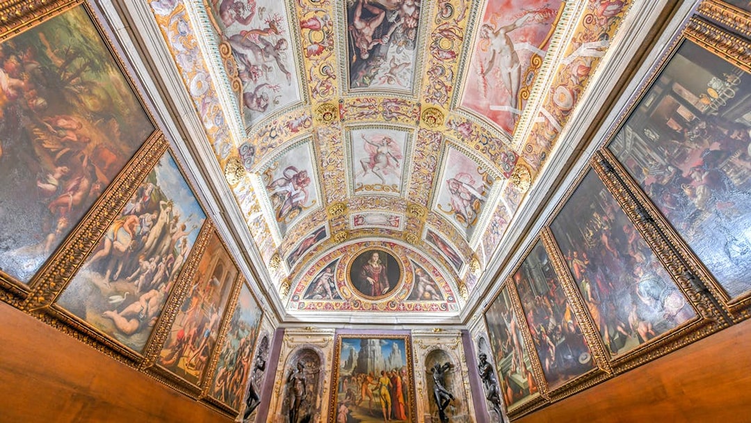 Palazzo Vecchio's ornate Renaissance ceiling and frescoes in Florence, Italy.