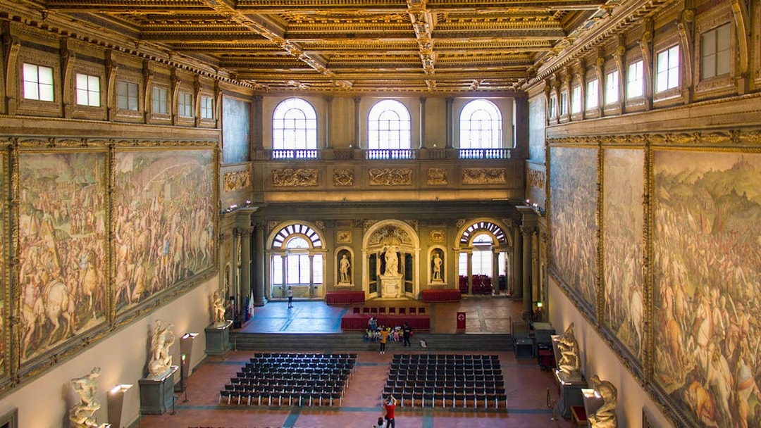 Palazzo Vecchio Hall of the Five Hundred with frescoes and statues, Florence, Italy.