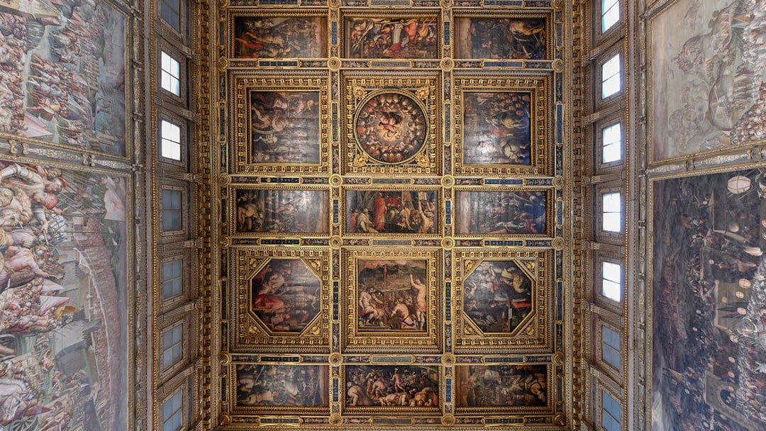 Palazzo Vecchio ornate ceiling with detailed frescoes, Florence, Italy.