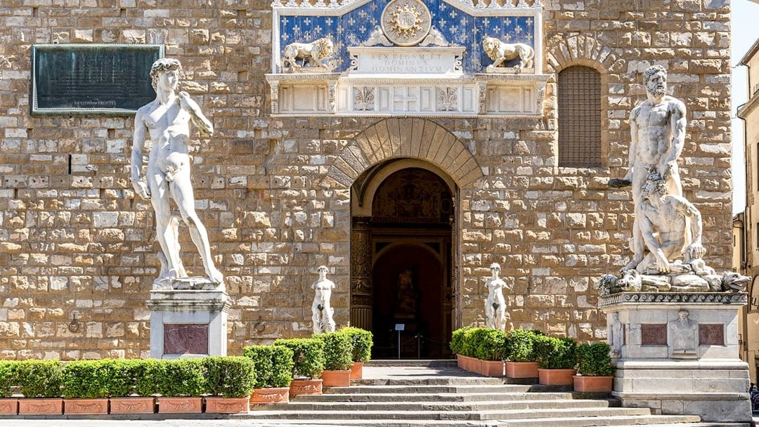 David and Michelangelo sculptures at Palazzo Vecchio Museum entrance, Florence.