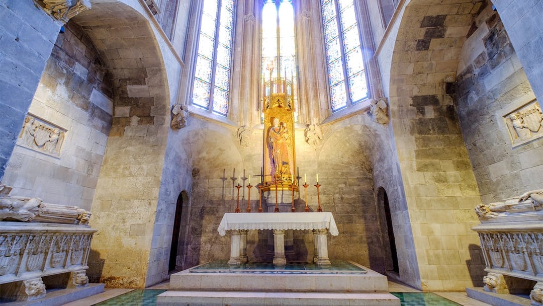 Altar and stained glass windows inside Palma Cathedral, Mallorca.