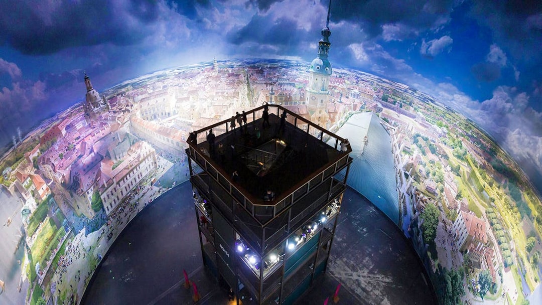 Panoramic view inside Panometer Dresden with cityscape mural.