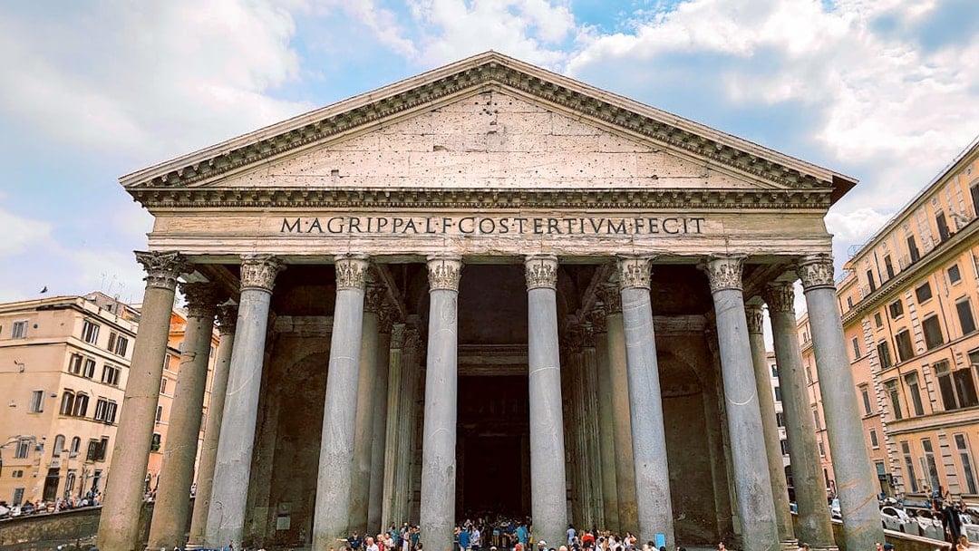 Pantheon facade with columns and crowd, Rome.