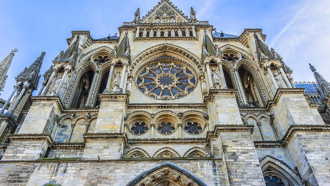 Facade of Reims Cathedral, a stop on the Champagne region day trip from Paris.