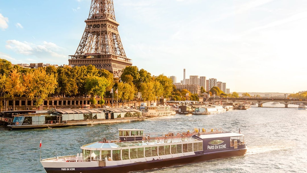 Paris En Scène dinner cruise on the Seine with Eiffel Tower view in Paris.