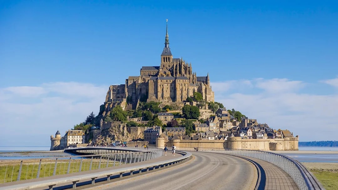 Mont Saint Michel abbey and causeway in Normandy, France.