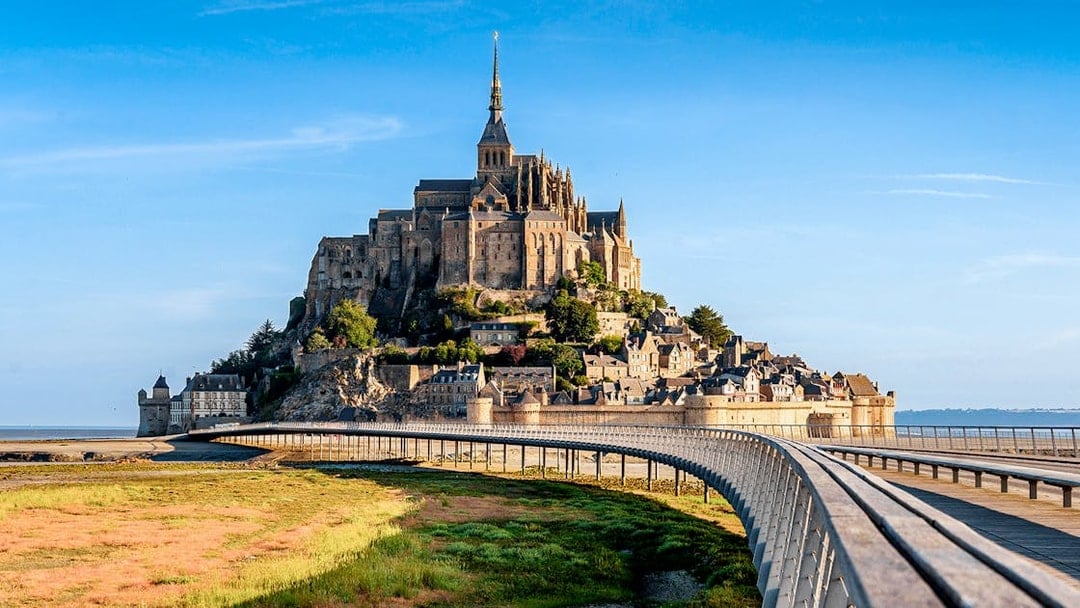 Mont St. Michel Abbey with bridge, viewed from mainland, Normandy, France.