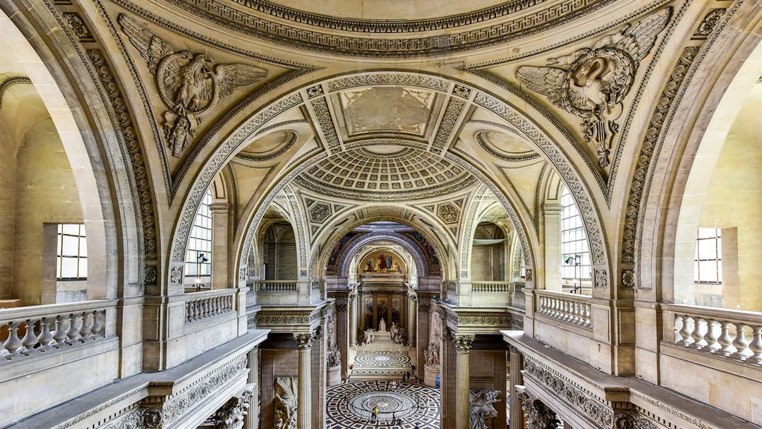 Paris Pantheon main hall with ornate arches and detailed ceiling.