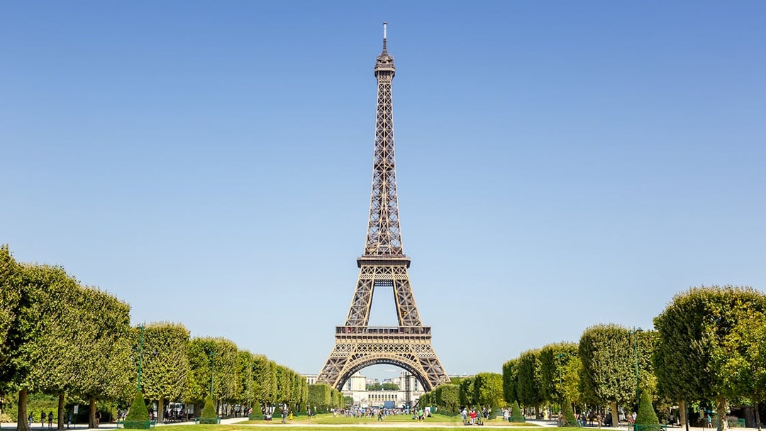 Eiffel Tower with surrounding gardens in Paris, France.