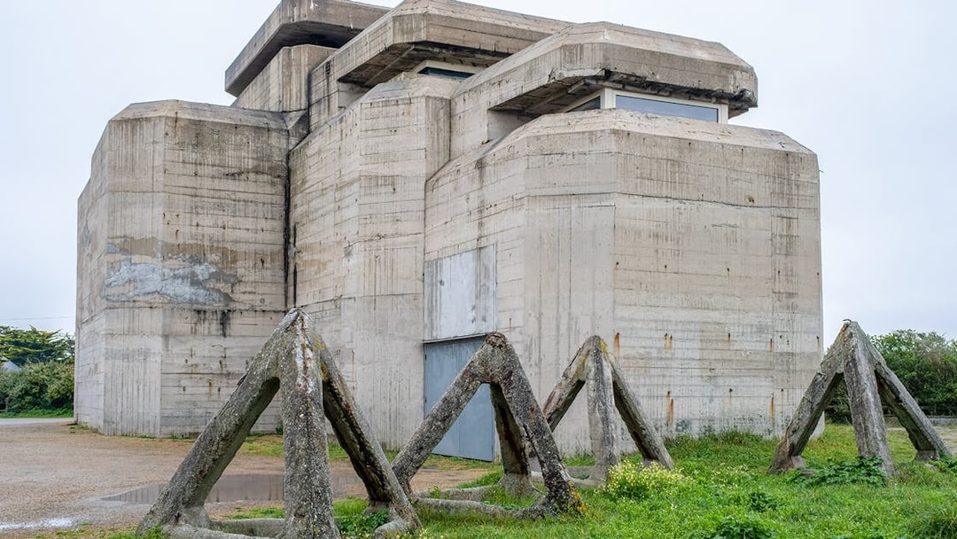 Normandy D-Day bunker with anti-tank obstacles, France.