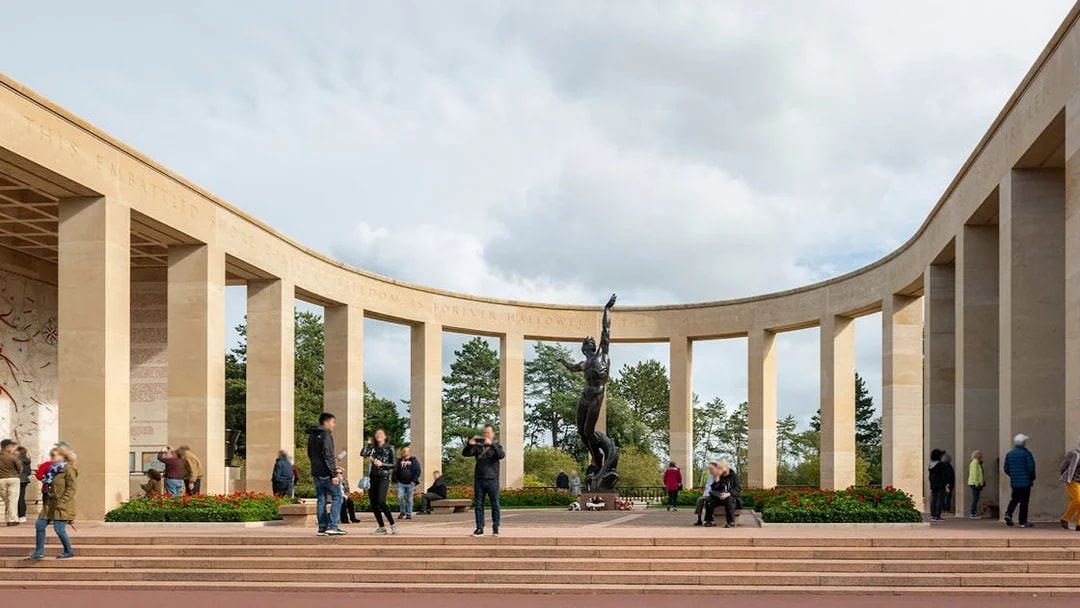 Visitors at Normandy American Cemetery memorial, WWII D-Day tour from Paris.