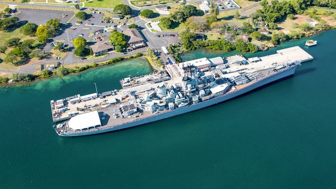 Battleship Missouri docked at Pearl Harbor, Oahu, viewed from above.