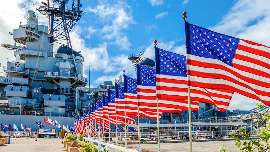 American flags line the path at Missouri Warship Memorial.