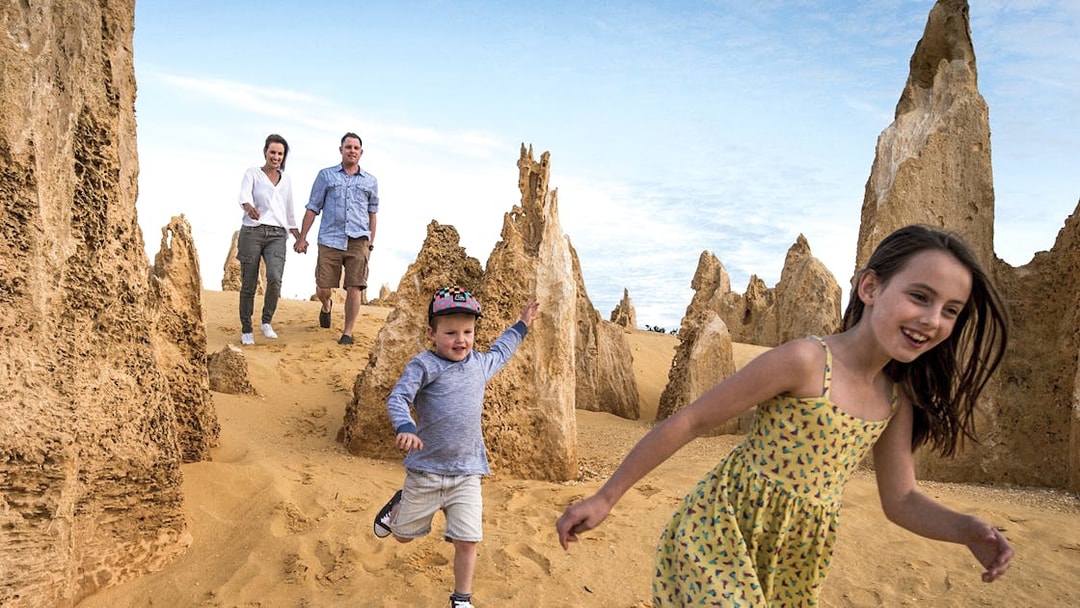 Family exploring Pinnacles Desert on a guided tour from Perth.