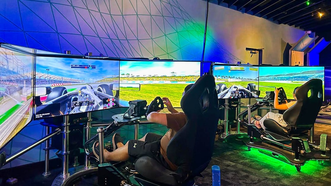 Visitors using racing simulators at Petrosains, The Discovery Centre in Kuala Lumpur.