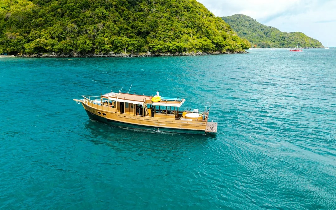 Phuket Private Longtail Boat Charter with Jacuzzi to Coral Island Banana Beach and Promthep Cape Image 7