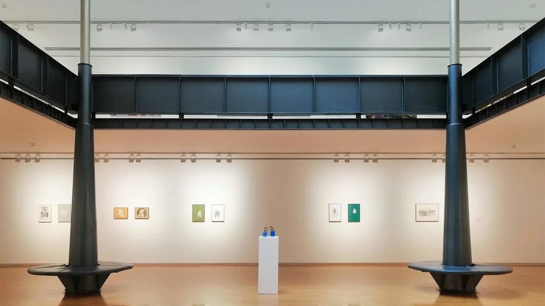 Exhibition room at Sala Parès in Barcelona featuring Picasso artworks on display.