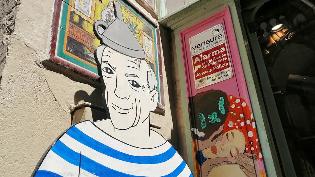 Picasso mural on a Barcelona street during the walking tour with museum entry.