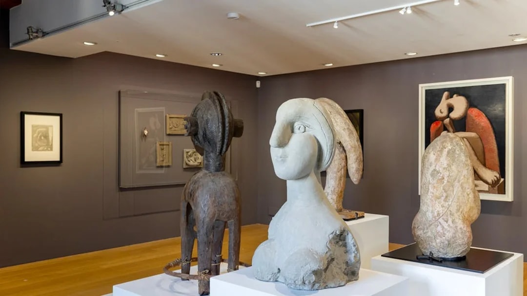 Sculptures and paintings in a gallery at the Picasso Museum, Barcelona.