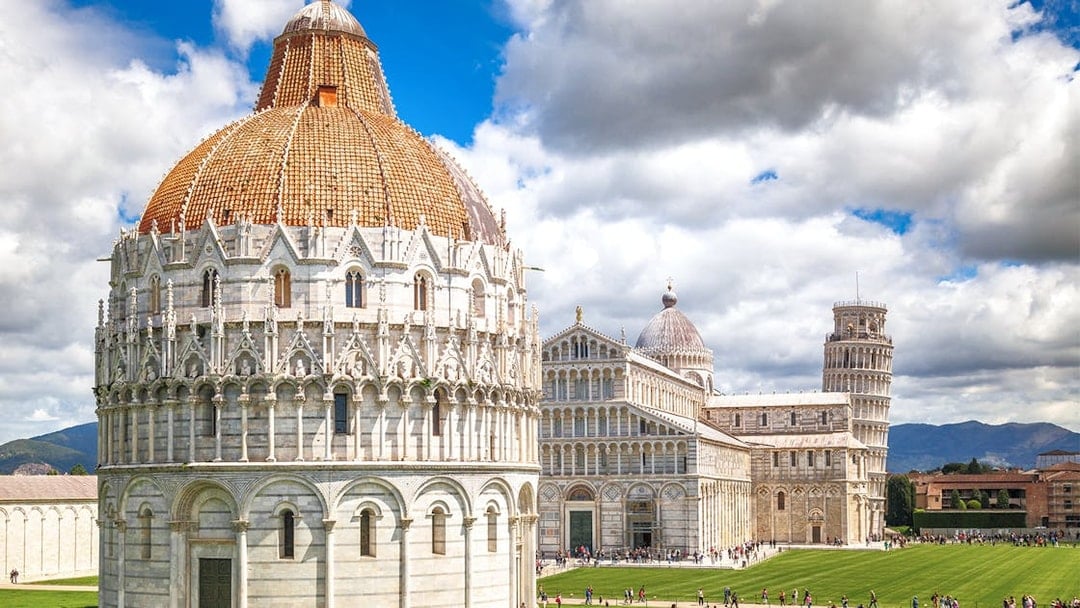 Baptistery and Cathedral at Pisa Monumental Complex, Italy.