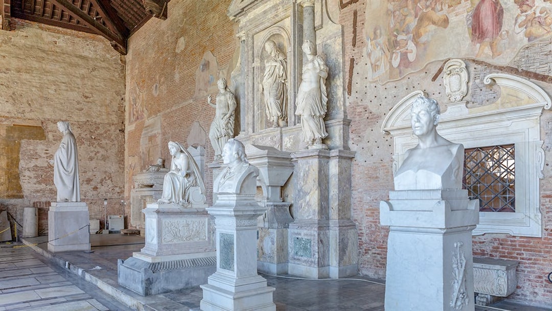 Sculptures inside Pisa Camposanto at Pisa Cathedral Square.