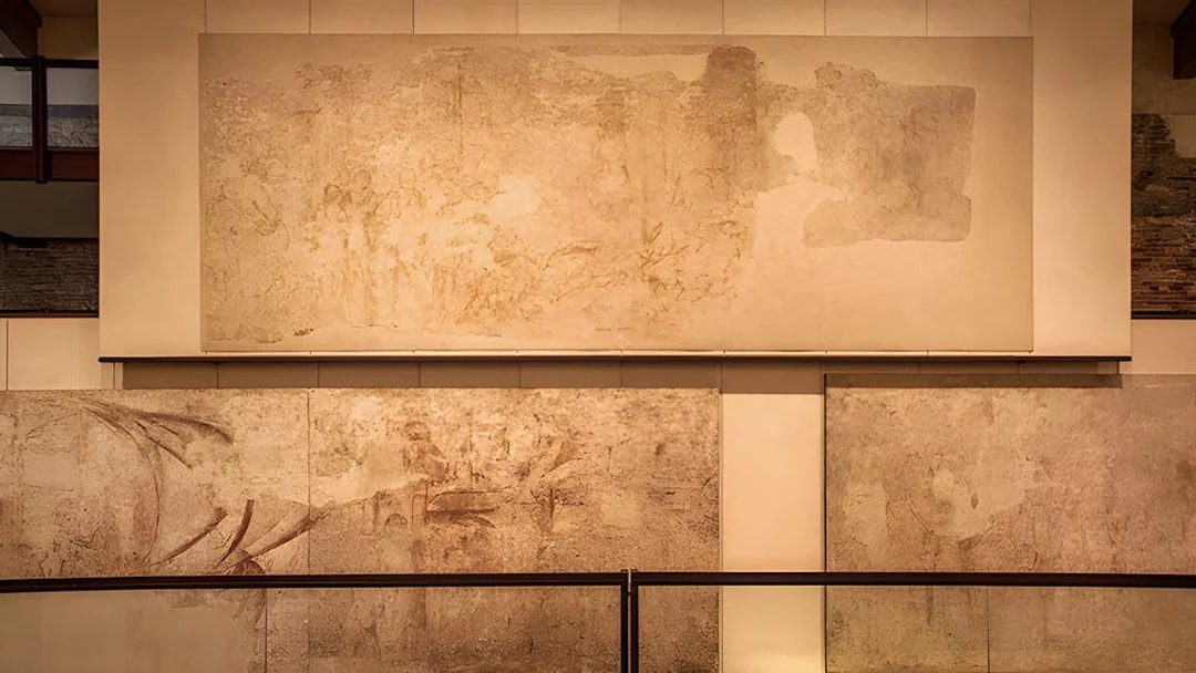 Paintings on display at Sinopie Museum, Pisa, showcasing historical fresco sketches.